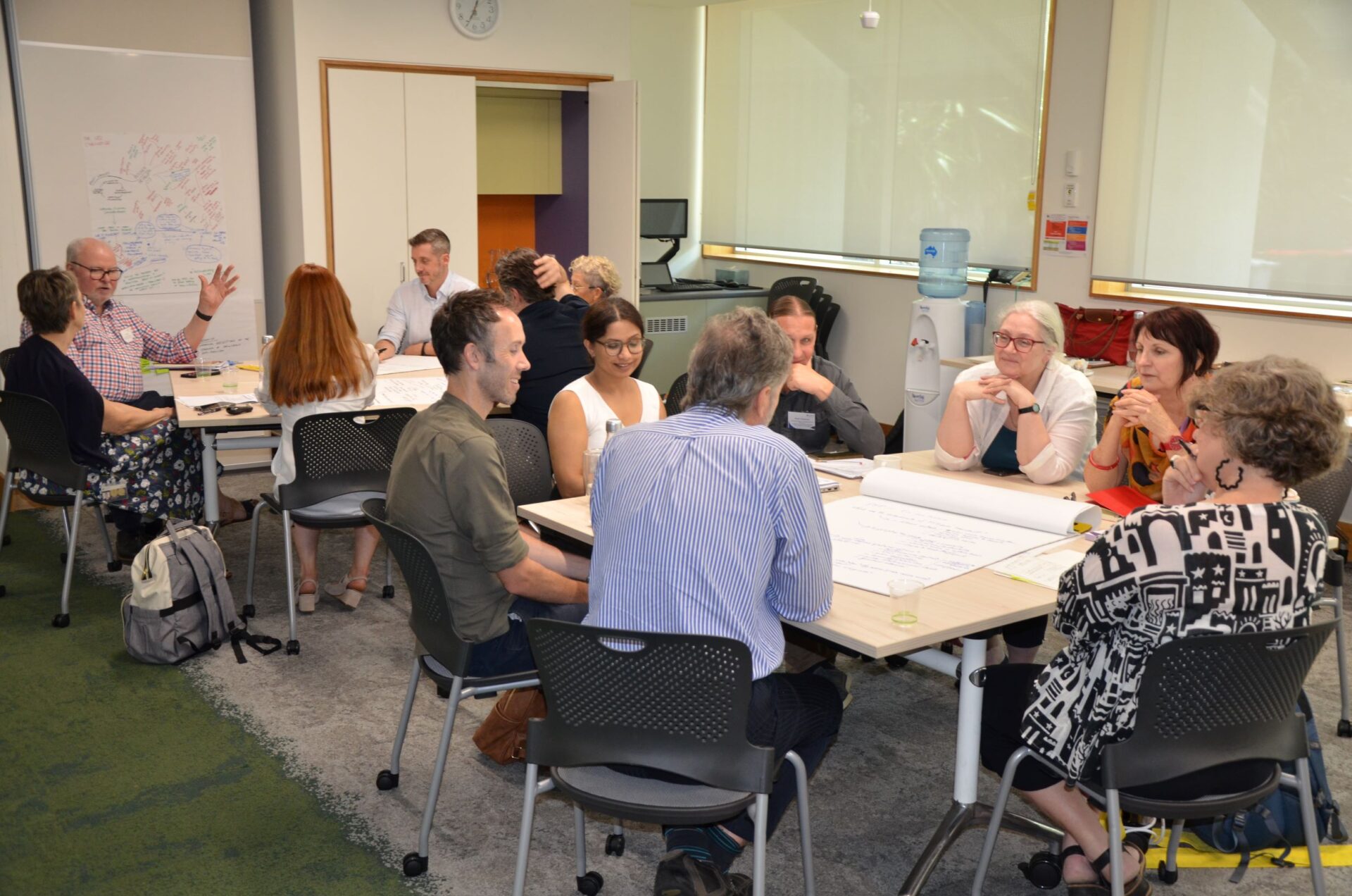 Academics collaborating around a table
