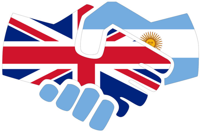 Graphic of hands shaking GB flags and Argentinian flag