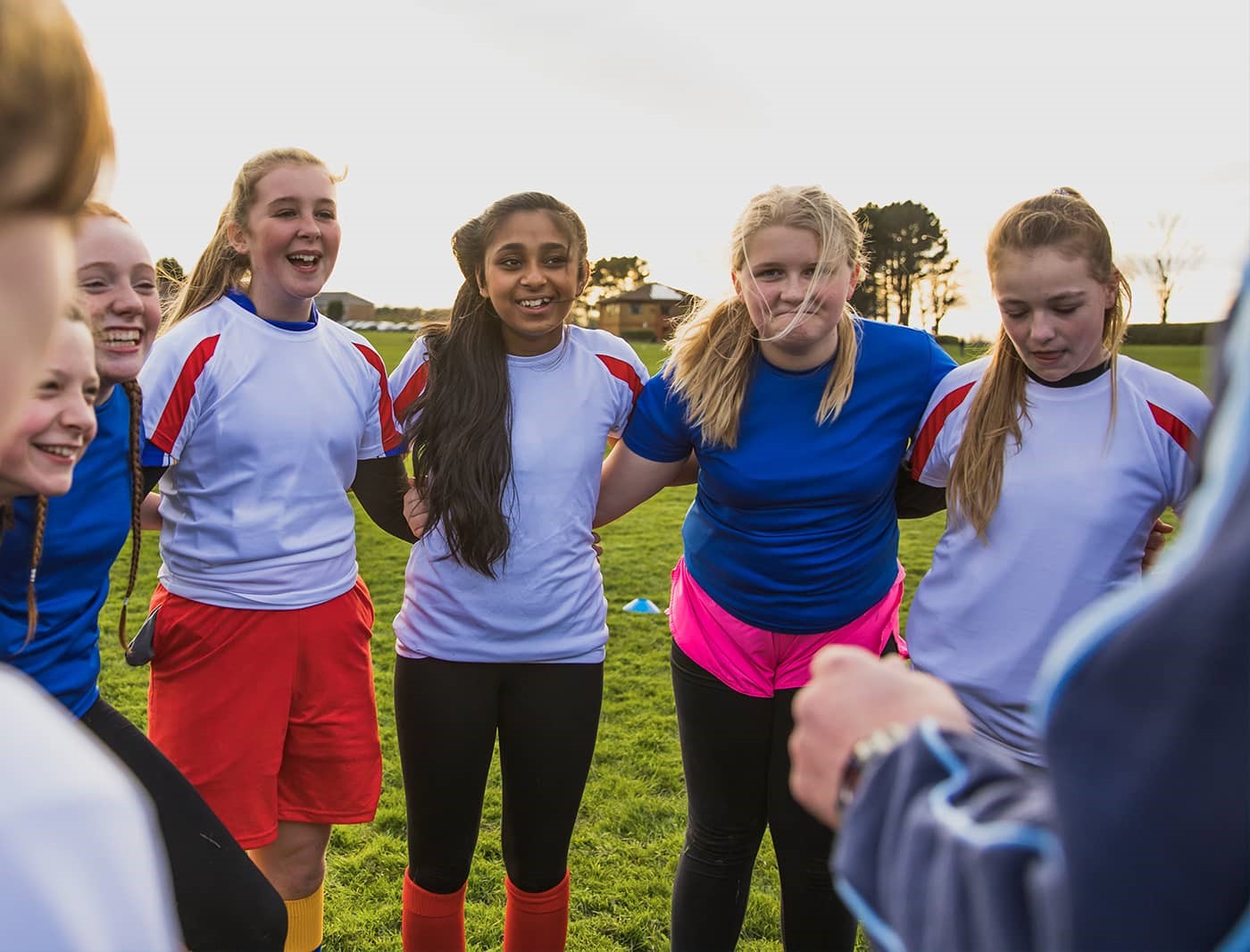 Photograph of teenage girls in sports kit